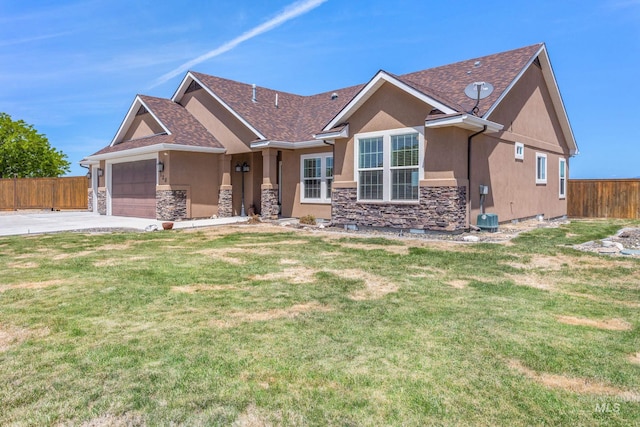 120 S Marko Ln, Kuna, ID 83634 - ranch-style home featuring stone siding, stucco siding, an attached garage, and a shingled roof