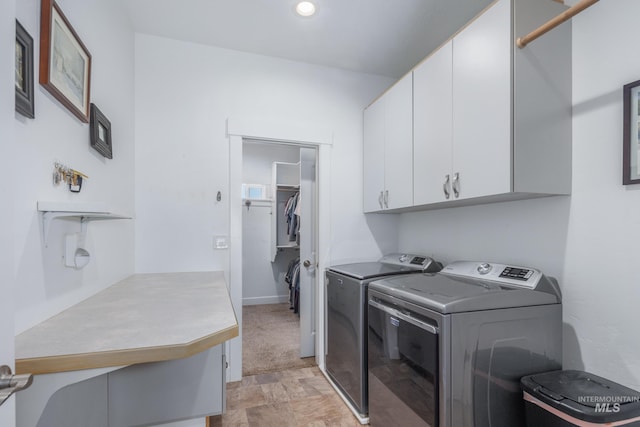 120 S Marko Ln, Kuna, ID 83634 - washroom with cabinet space, washer and clothes dryer, baseboards, recessed lighting, and light stone finish flooring