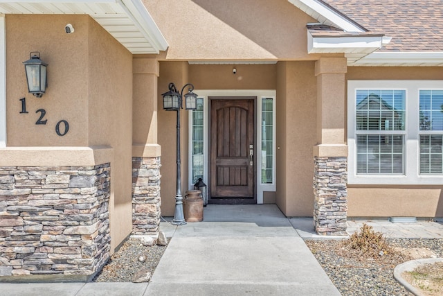 120 S Marko Ln, Kuna, ID 83634 - view of exterior entry with stucco siding and stone siding
