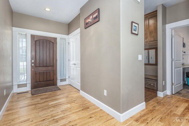 120 S Marko Ln, Kuna, ID 83634 - foyer with light wood finished floors and baseboards