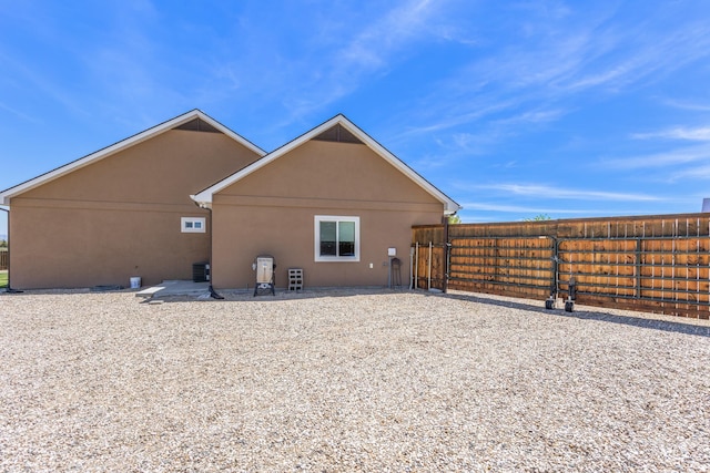 120 S Marko Ln, Kuna, ID 83634 - back of house with stucco siding and central AC