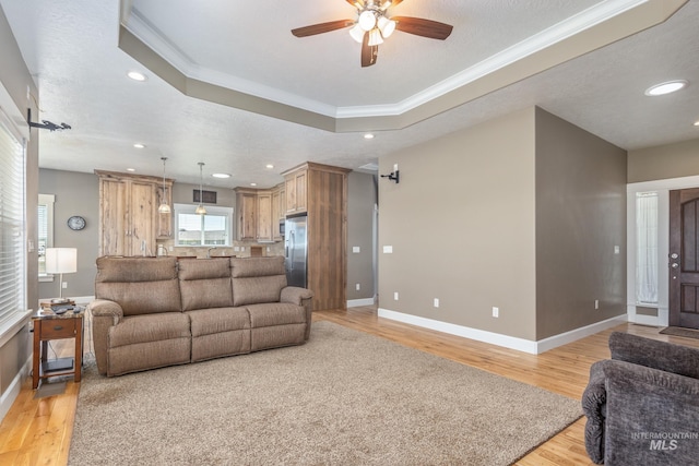 120 S Marko Ln, Kuna, ID 83634 - living area featuring a ceiling fan, light wood finished floors, ornamental molding, baseboards, and recessed lighting
