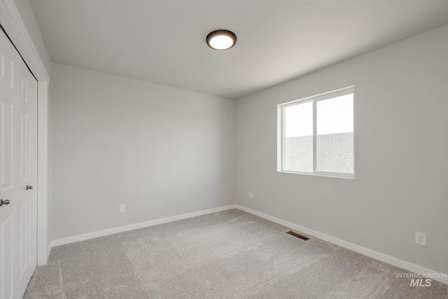 12596 Kinsella St, Nampa, ID 83651 - unfurnished bedroom featuring carpet, visible vents, and baseboards