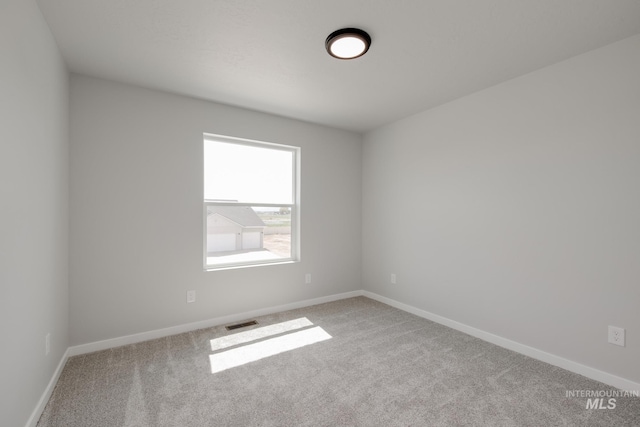 12596 Kinsella St, Nampa, ID 83651 - carpeted spare room featuring visible vents and baseboards
