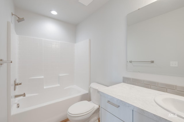 12596 Kinsella St, Nampa, ID 83651 - bathroom with recessed lighting, toilet, vanity, and washtub / shower combination