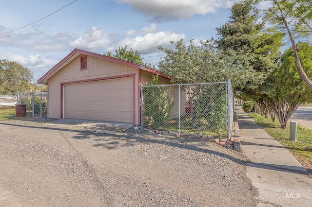 detached garage with fence