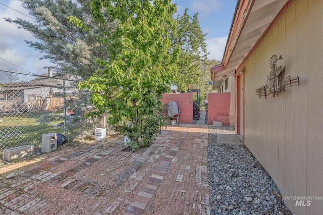 view of patio with fence