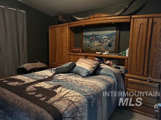 16 E 300 S Unit 16E 300S, Fairfield, ID 83327 - carpeted bedroom with vaulted ceiling