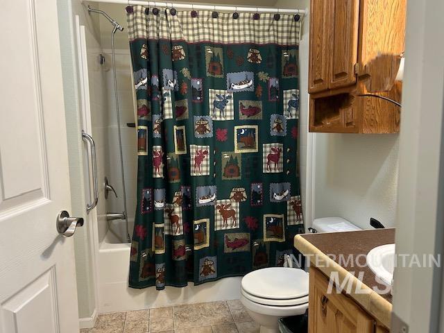 16 E 300 S Unit 16E 300S, Fairfield, ID 83327 - bathroom featuring vanity, toilet, and shower / bathtub combination with curtain
