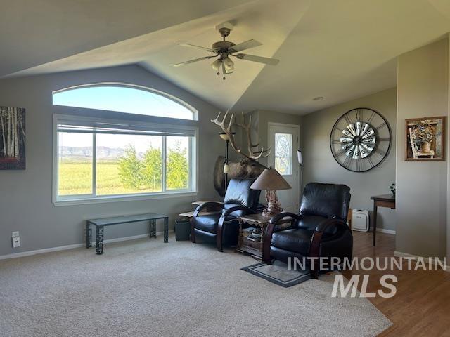 16 E 300 S Unit 16E 300S, Fairfield, ID 83327 - living area with ceiling fan, vaulted ceiling, and baseboards