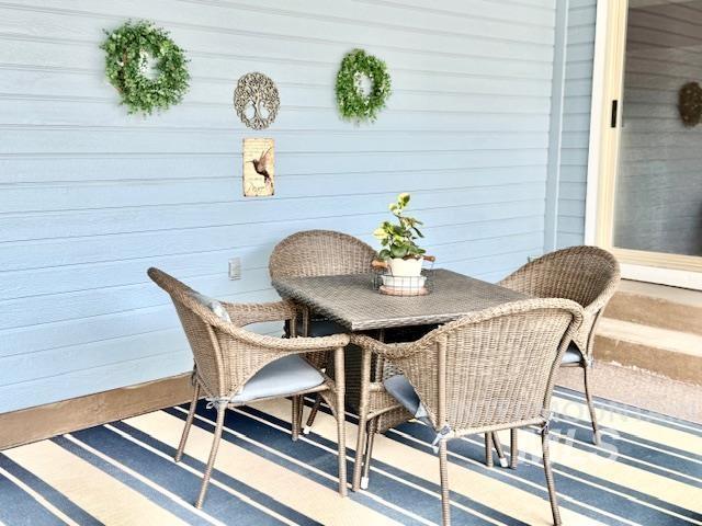 1460 Fairway Ct, Mountain Home, ID 83647 - view of patio / terrace featuring outdoor dining space