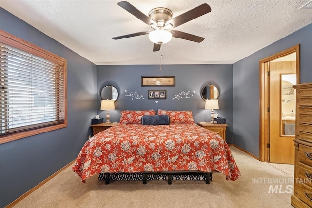 1460 Fairway Ct, Mountain Home, ID 83647 - carpeted bedroom with a ceiling fan and a textured ceiling