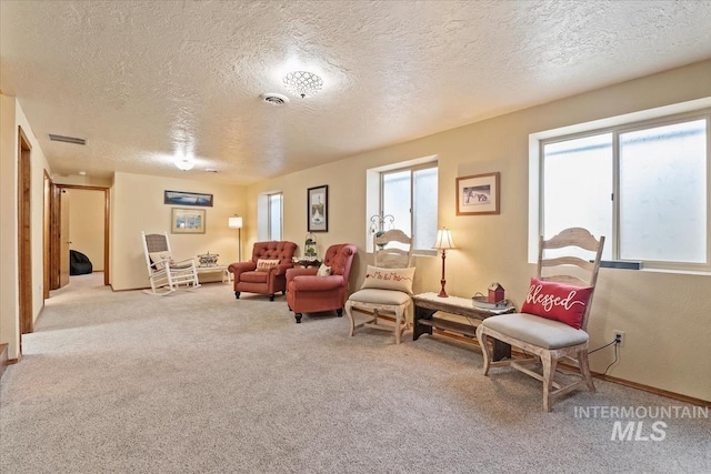 1460 Fairway Ct, Mountain Home, ID 83647 - carpeted living area featuring a textured ceiling and baseboards