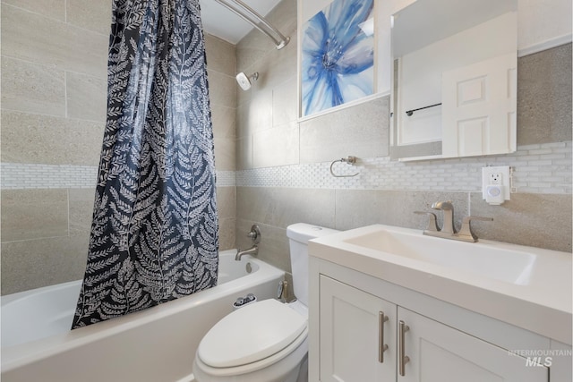 full bathroom featuring shower / tub combo, tile walls, vanity, tasteful backsplash, and toilet