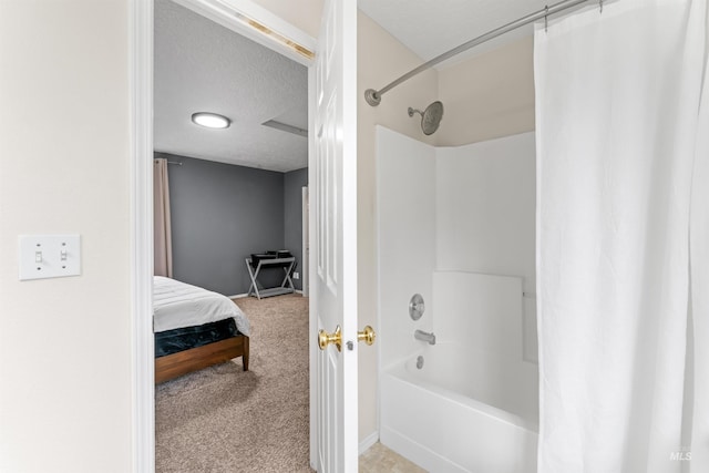 5509 Aspenwood Ave, Caldwell, ID 83607 - ensuite bathroom featuring shower / bath combination with curtain and a textured ceiling