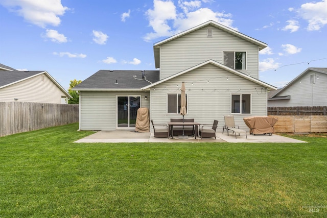 5509 Aspenwood Ave, Caldwell, ID 83607 - rear view of house featuring a patio area, a fenced backyard, and outdoor lounge area