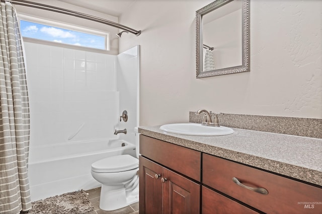 bathroom featuring shower / tub combo with curtain, vanity, toilet, and tile patterned floors