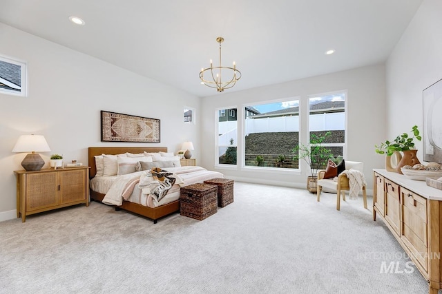 bedroom with baseboards, recessed lighting, a notable chandelier, and light carpet