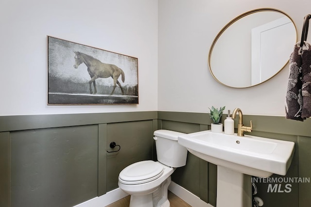 bathroom with a sink and toilet