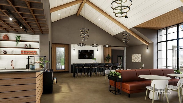 living room featuring finished concrete flooring, bar area, high vaulted ceiling, and beam ceiling
