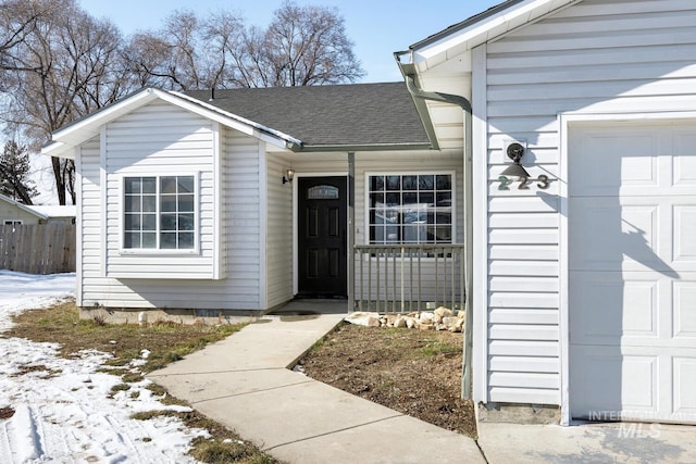 property entrance featuring a garage