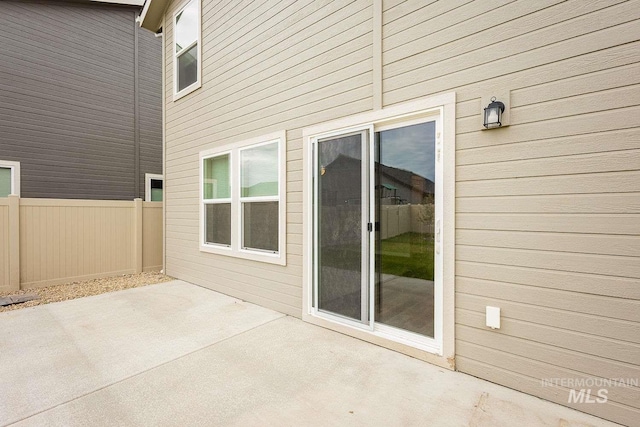 7666 E Lightfoot St, Nampa, ID 83687 - view of patio / terrace with fence