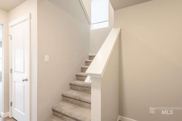 7666 E Lightfoot St, Nampa, ID 83687 - stairs with baseboards