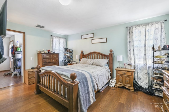 706 Utah St, Gooding, ID 83330 - bedroom featuring dark wood-style flooring