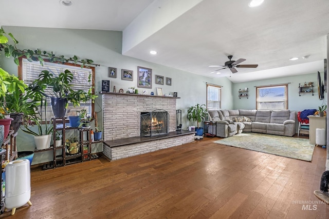 706 Utah St, Gooding, ID 83330 - living room with a ceiling fan, wood finished floors, recessed lighting, and a brick fireplace