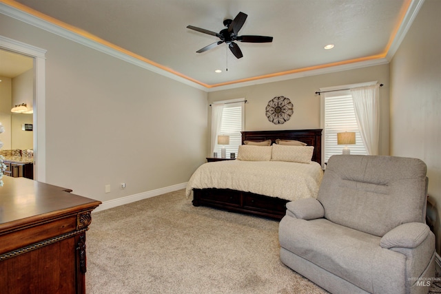 carpeted bedroom with ornamental molding and ceiling fan