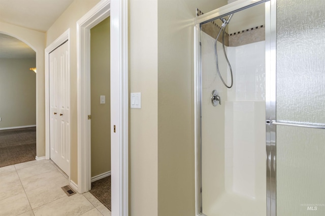 421 N David Frost St, Nampa, ID 83651 - full bathroom with a stall shower, tile patterned floors, and baseboards