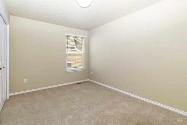 421 N David Frost St, Nampa, ID 83651 - spare room featuring light carpet and baseboards