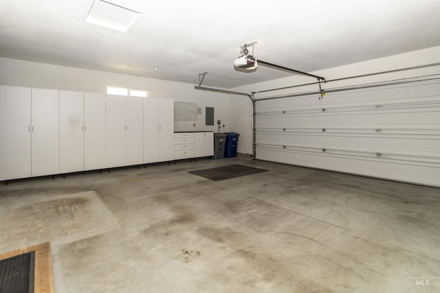 421 N David Frost St, Nampa, ID 83651 - garage with a garage door opener and electric panel