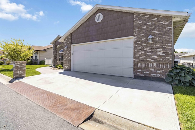421 N David Frost St, Nampa, ID 83651 - single story home featuring driveway and an attached garage
