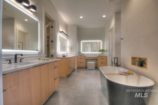 473 Joy Ave, Middleton, ID 83644 - full bath featuring a sink, radiator heating unit, two vanities, a soaking tub, and recessed lighting