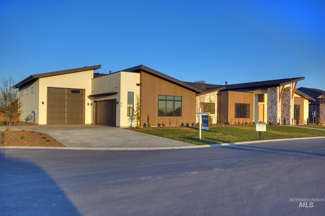 473 Joy Ave, Middleton, ID 83644 - view of front of property with a front yard, driveway, and a garage