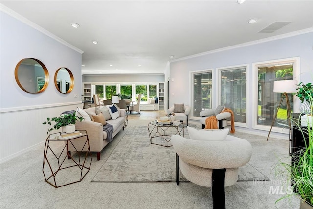2368 SE 5th Way, Meridian, ID 83642 - living room featuring a wainscoted wall, crown molding, and recessed lighting