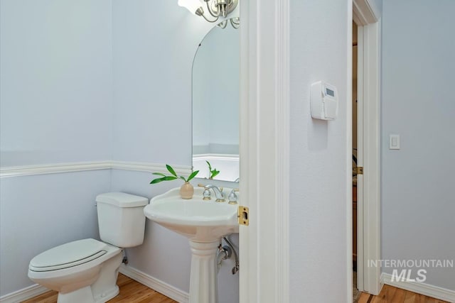 2368 SE 5th Way, Meridian, ID 83642 - half bath featuring toilet and wood finished floors