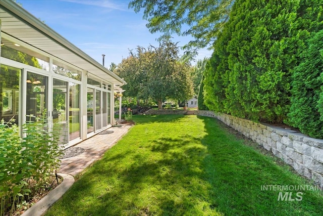 2368 SE 5th Way, Meridian, ID 83642 - view of grassy yard with a sunroom