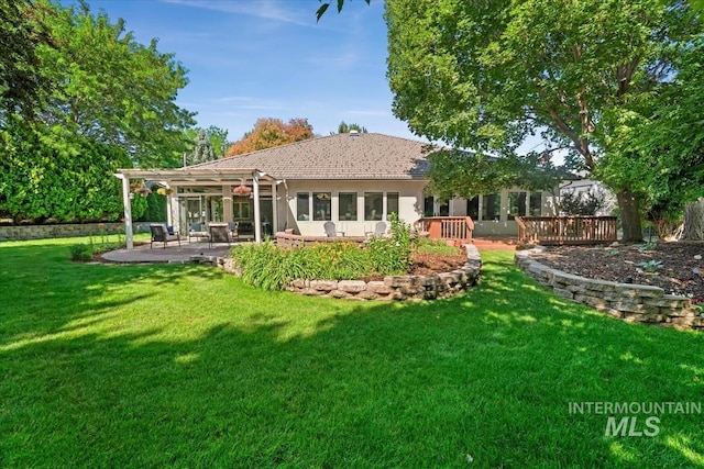2368 SE 5th Way, Meridian, ID 83642 - rear view of house featuring a pergola, a lawn, a wooden deck, and a patio area