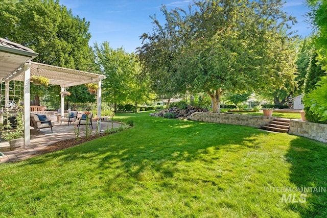 2368 SE 5th Way, Meridian, ID 83642 - view of green lawn with a pergola, a patio, and an outdoor living space