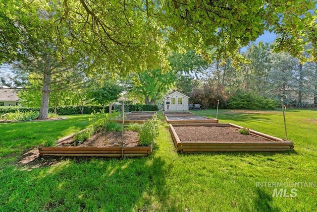 2368 SE 5th Way, Meridian, ID 83642 - view of grassy yard featuring a garden
