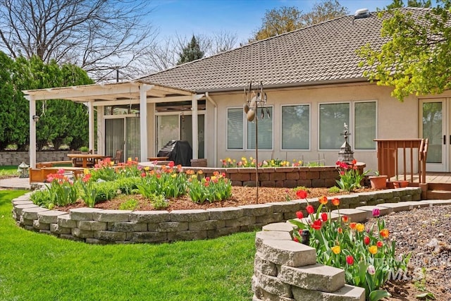 2368 SE 5th Way, Meridian, ID 83642 - back of house with a tiled roof, stucco siding, a pergola, and a yard