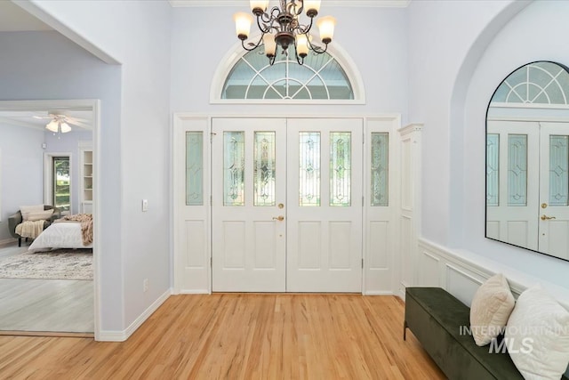 2368 SE 5th Way, Meridian, ID 83642 - foyer entrance with a chandelier, light wood-style flooring, a towering ceiling, and ceiling fan