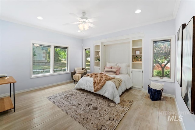 2368 SE 5th Way, Meridian, ID 83642 - bedroom featuring multiple windows, light wood-style flooring, ornamental molding, recessed lighting, and ceiling fan