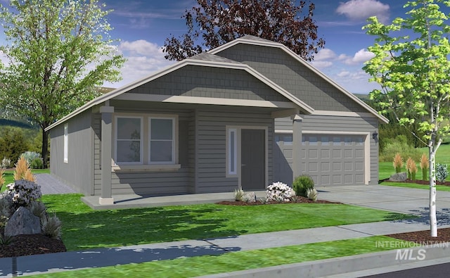 view of front facade featuring a front yard and a garage