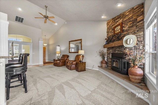 160 Summit Ridge Rd, Horseshoe Bend, ID 83629 - living area with ceiling fan, light carpet, baseboards, and high vaulted ceiling