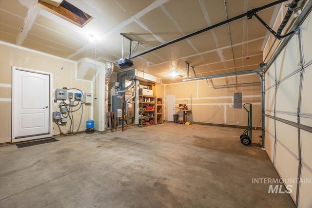 160 Summit Ridge Rd, Horseshoe Bend, ID 83629 - garage with a garage door opener, electric panel, and heating unit