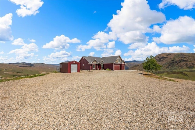 160 Summit Ridge Rd, Horseshoe Bend, ID 83629 - view of front facade with a garage and driveway