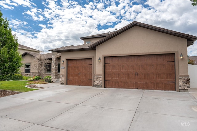 view of front of home with a garage